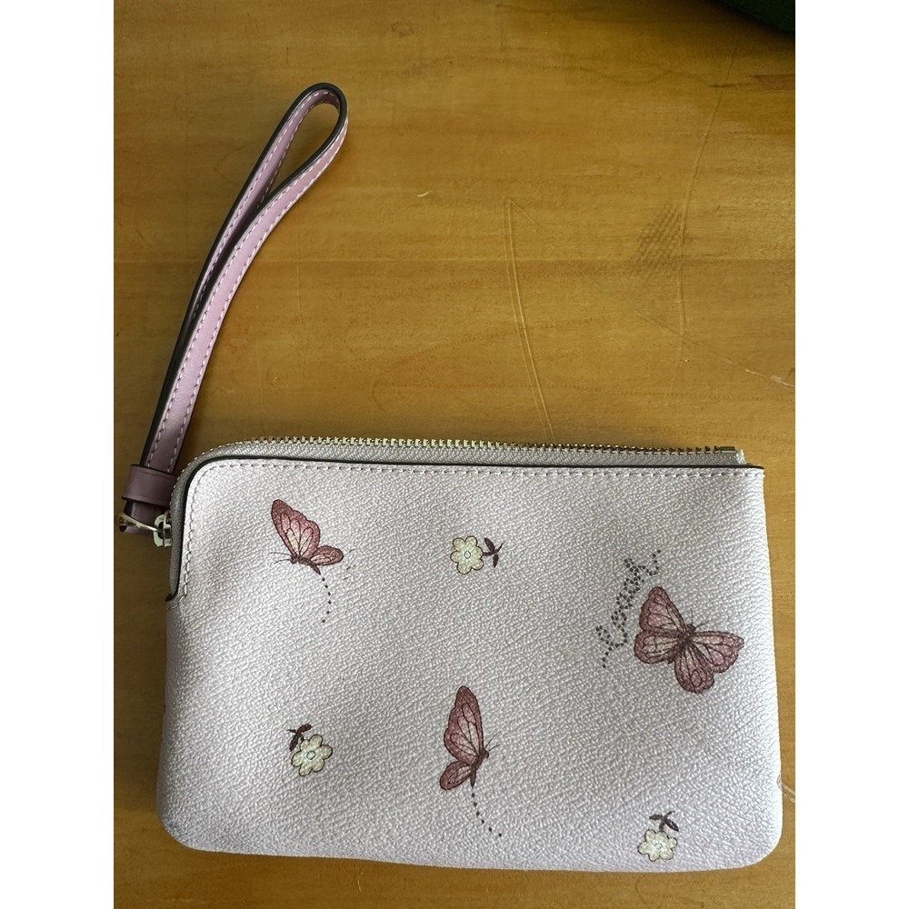 Coach Pink With Butterflies Zipper Wristlet New With Tags.